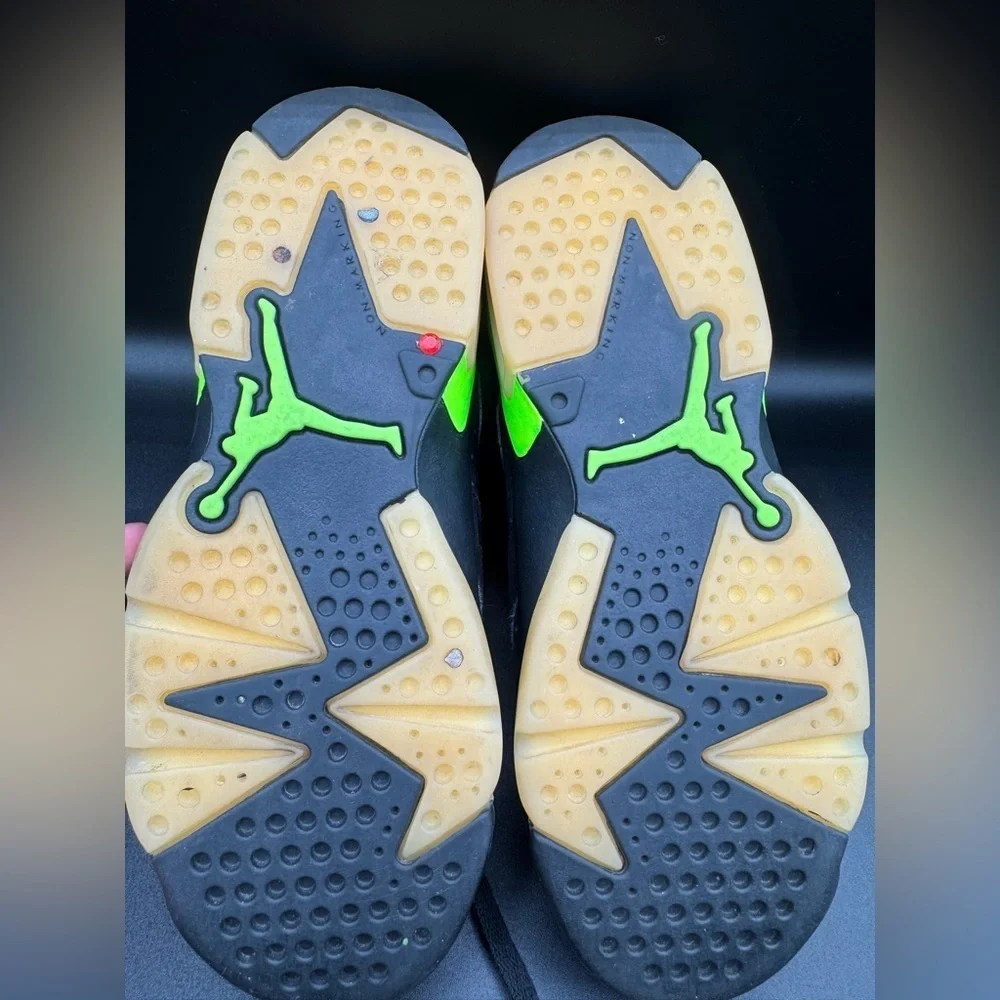 Jordan Black and Green Sneakers with Air Unit and Perforated Panels
